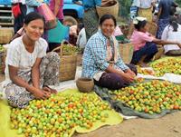 Local women at a market in Myanmar.